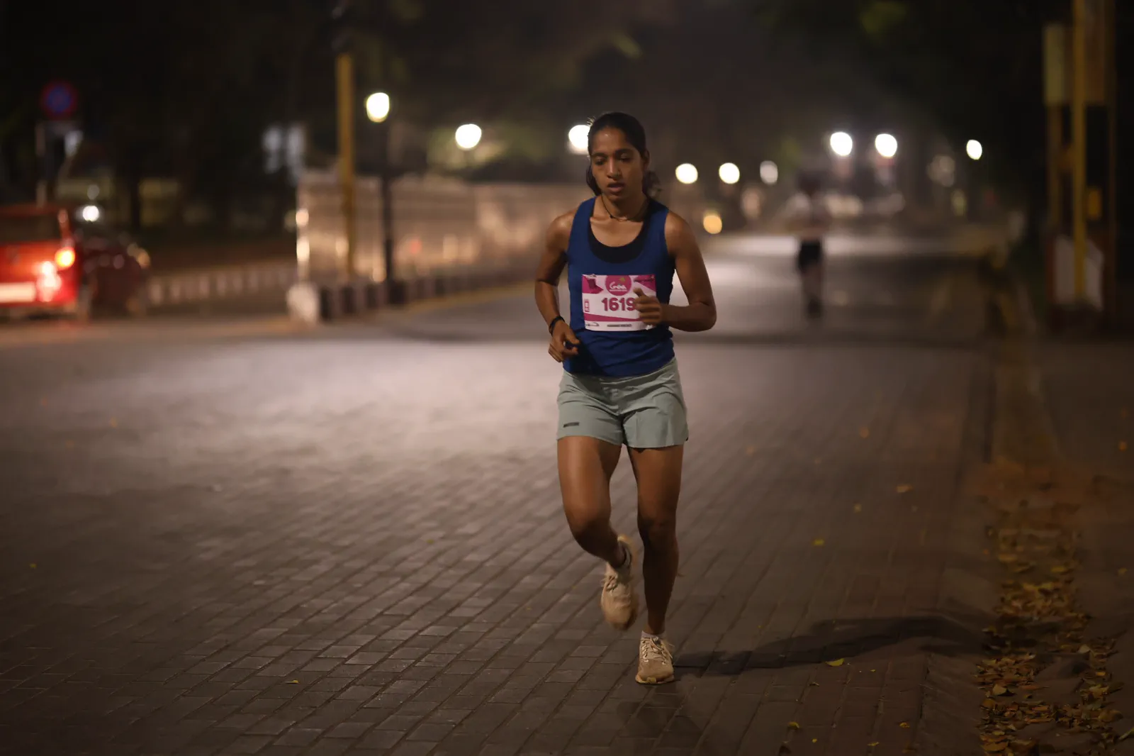 A Goa Marathon participant running along the course